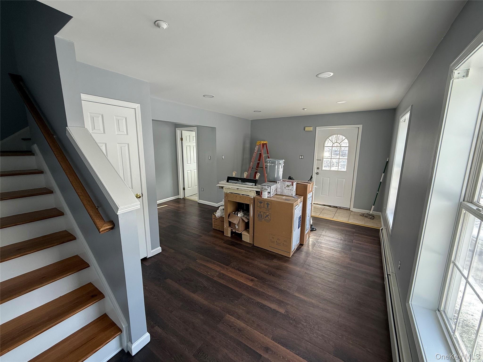 17 Orchard Place, Unit C Poughkeepsie, NY 12601 - Photo 2 of 20 a living room with furniture and a wooden floor