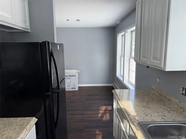 a view of a kitchen cabinets