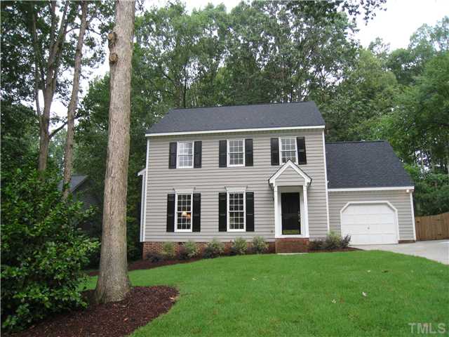 5709 Edgedale Drive Raleigh, NC 27612 - Photo 1 of 12 front view of a house with a yard