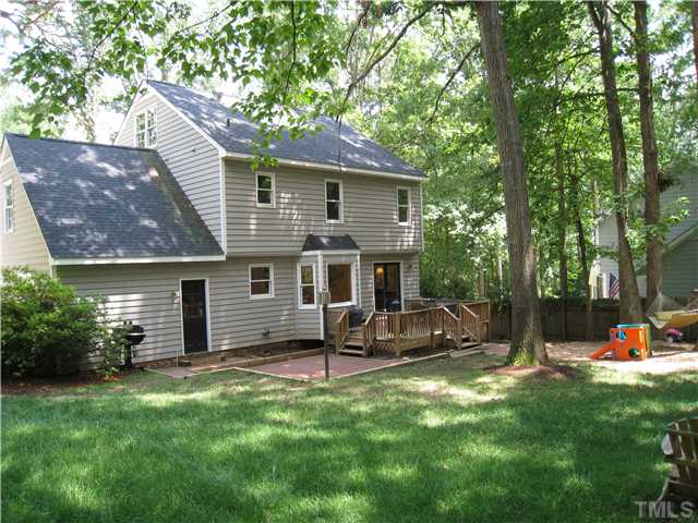 5709 Edgedale Drive Raleigh, NC 27612 - Photo 2 of 12 front view of a house with a yard