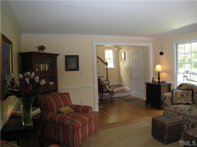 5709 Edgedale Drive Raleigh, NC 27612 - Photo 4 of 12 a living room with furniture and a large window