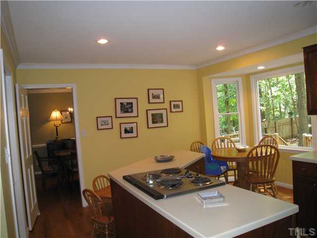 5709 Edgedale Drive Raleigh, NC 27612 - Photo 5 of 12 a living room with furniture and a window