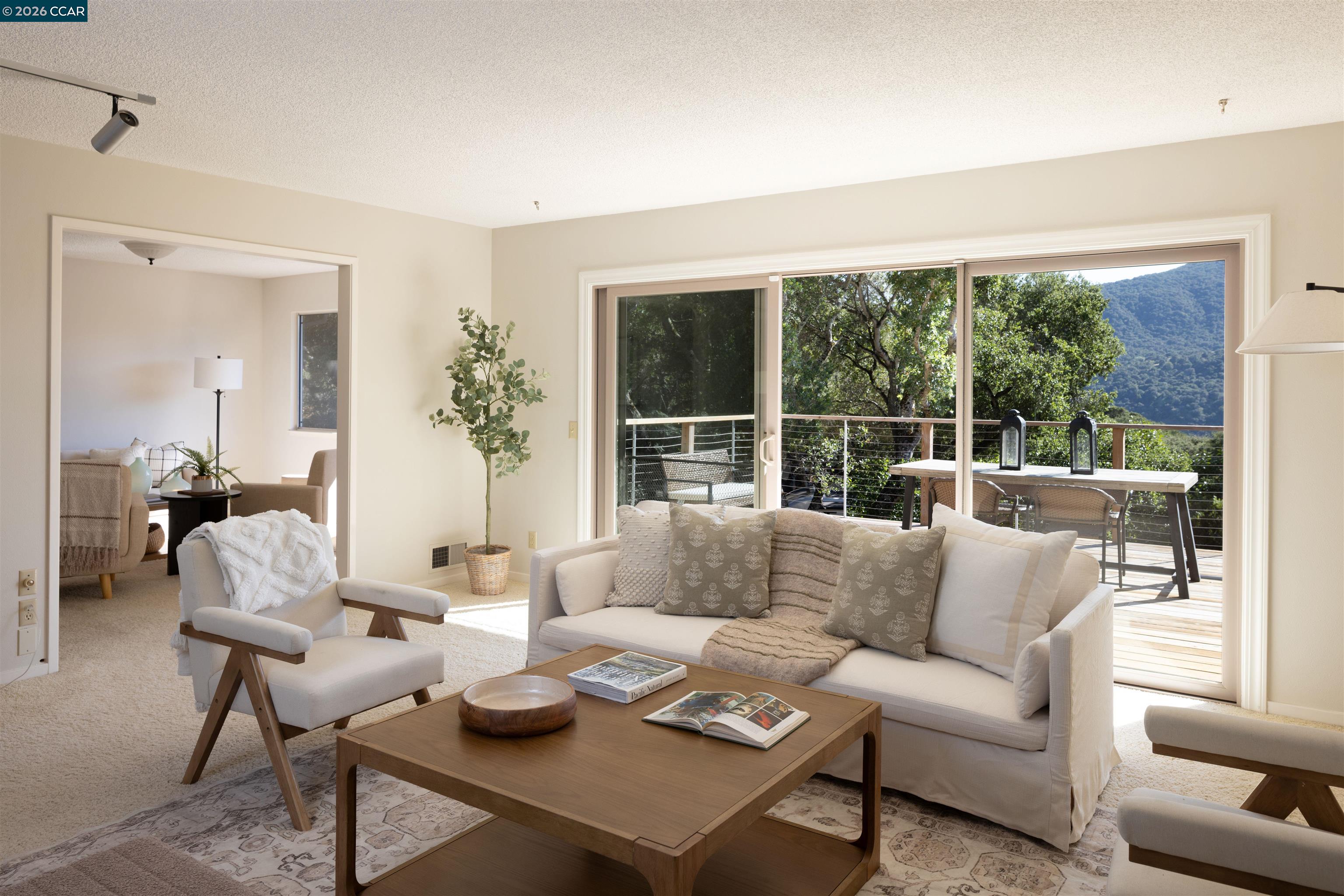 12 Marquard Road Carmel Valley, CA 93924 - Photo 13 of 36 a living room with furniture and a large window