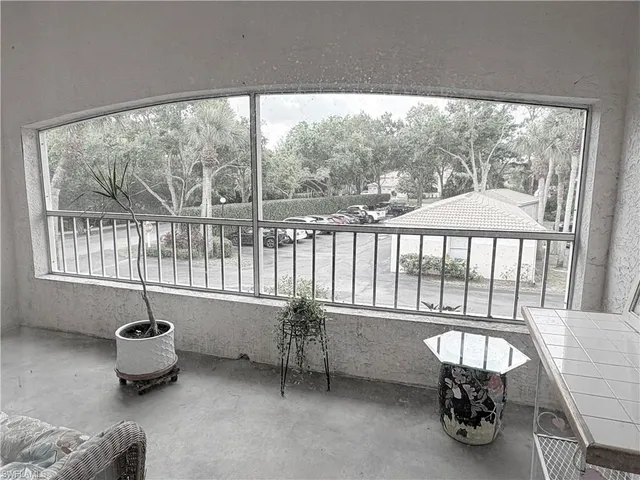 $235,000 | 1096 Woodshire Lane, Unit C205, Naples, FL 34105