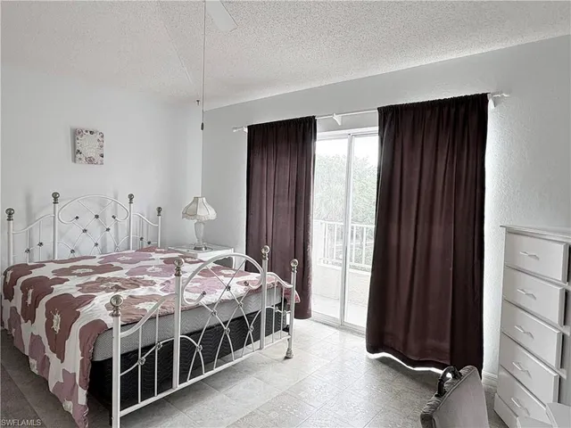a bathroom with a bathtub double vanity sink and mirror