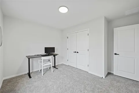 a view of a livingroom with furniture