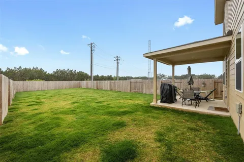 a view of outdoor space with deck and patio
