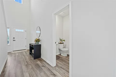 a view of kitchen with wooden floor