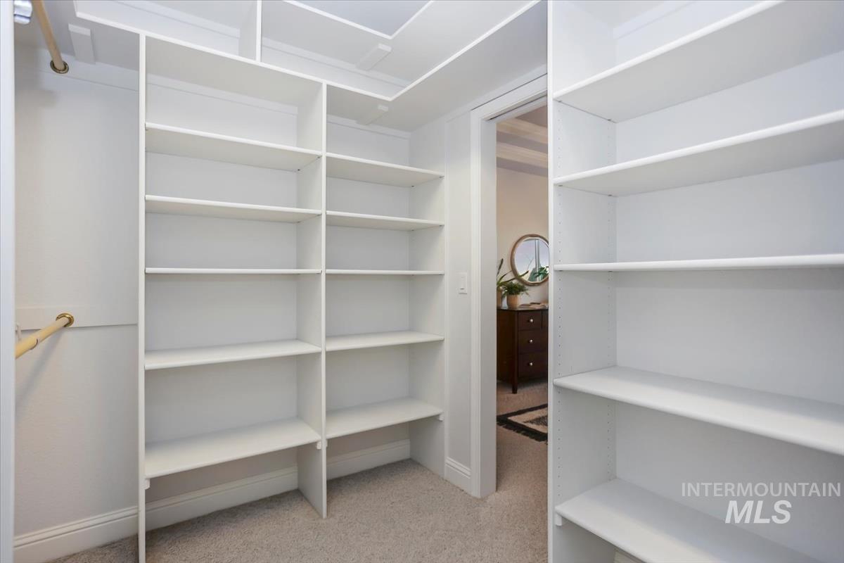 25074 The Driving Lane Caldwell, ID 83607 - Photo 16 of 29 Walk in closet with light carpet
