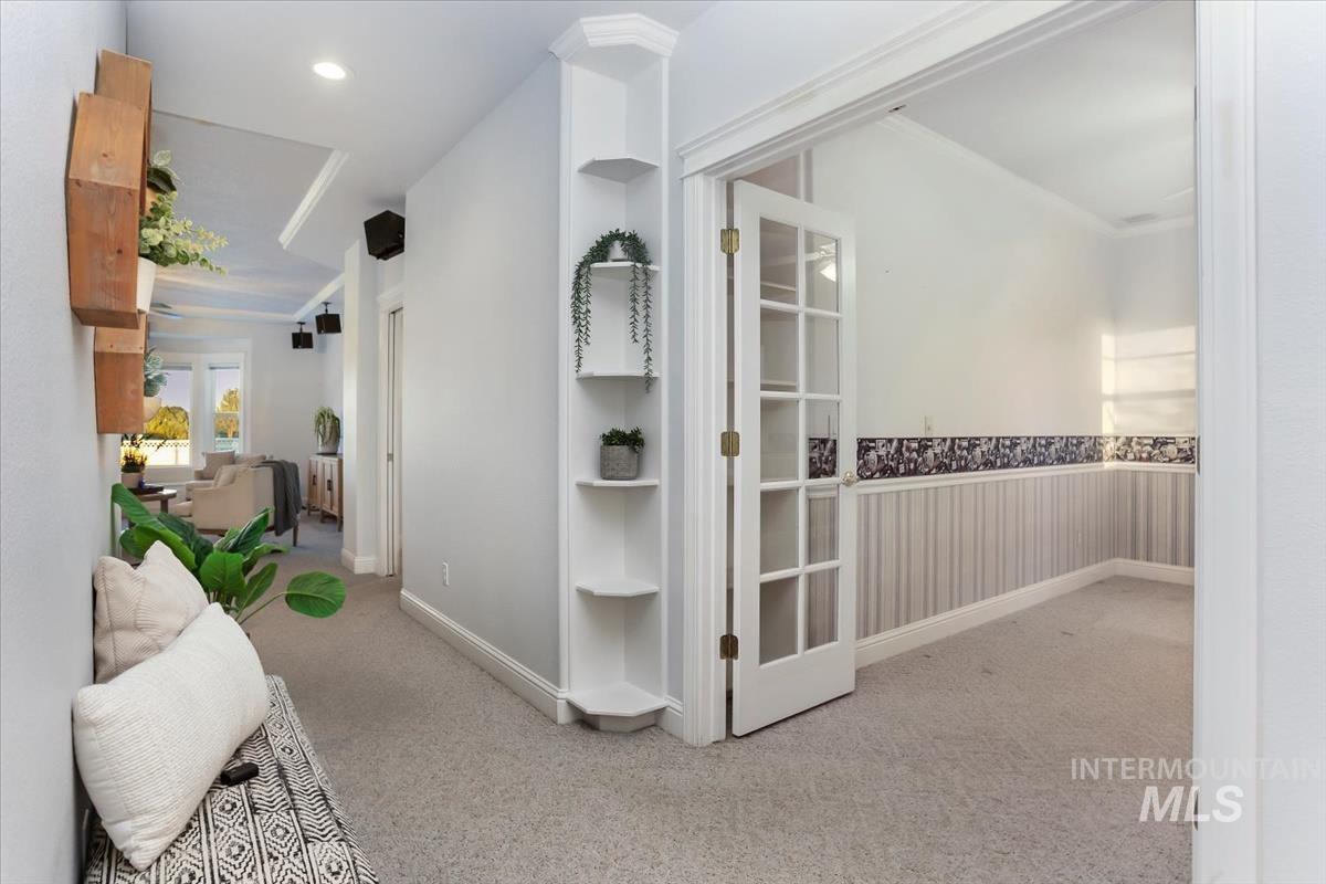 25074 The Driving Lane Caldwell, ID 83607 - Photo 19 of 29 Corridor with light carpet and recessed lighting