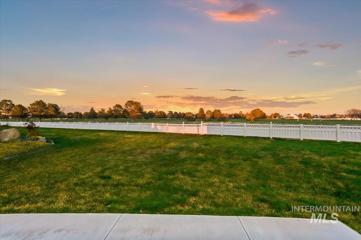 25074 The Driving Lane Caldwell, ID 83607 - Photo 23 of 29 View of yard at dusk