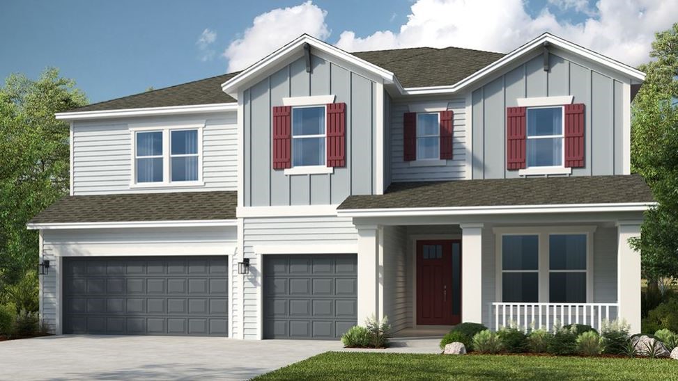 86579 Oar Row North Yulee, FL 32097 - Photo 1 of 28 a front view of a house with garden