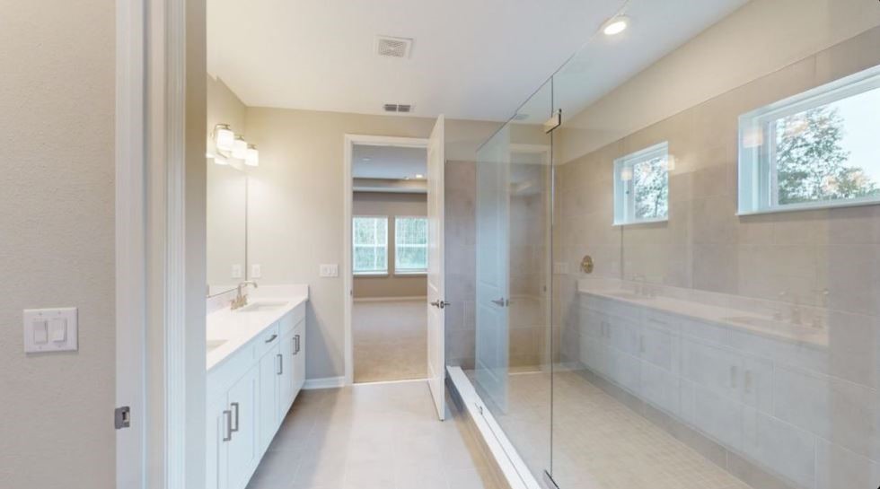 86579 Oar Row North Yulee, FL 32097 - Photo 22 of 28 a bathroom with a tub shower and sink