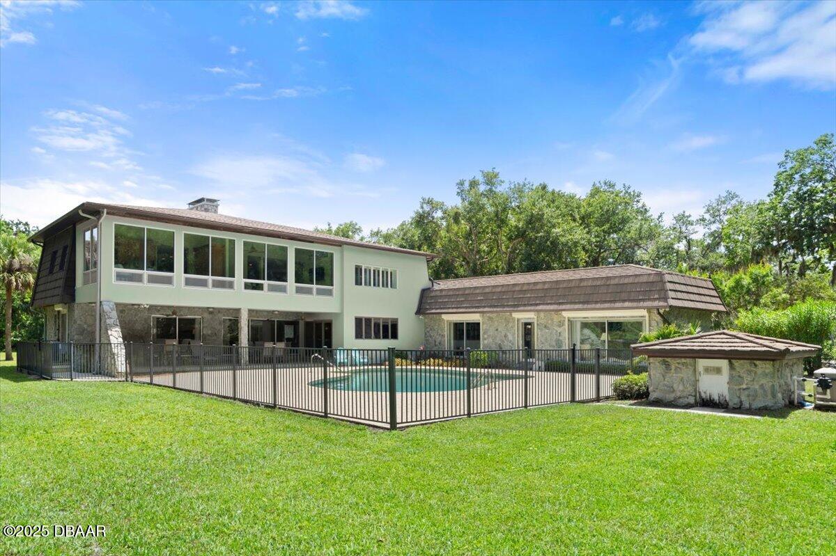 1010 Big Tree Road Daytona Beach, FL 32119 - Photo 17 of 41 a view of house with yard and entertaining space