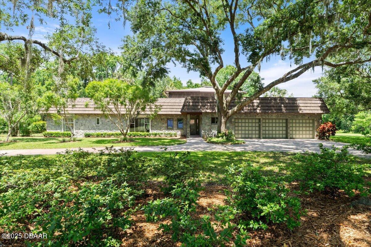 1010 Big Tree Road Daytona Beach, FL 32119 - Photo 32 of 41 a front view of a house with a yard