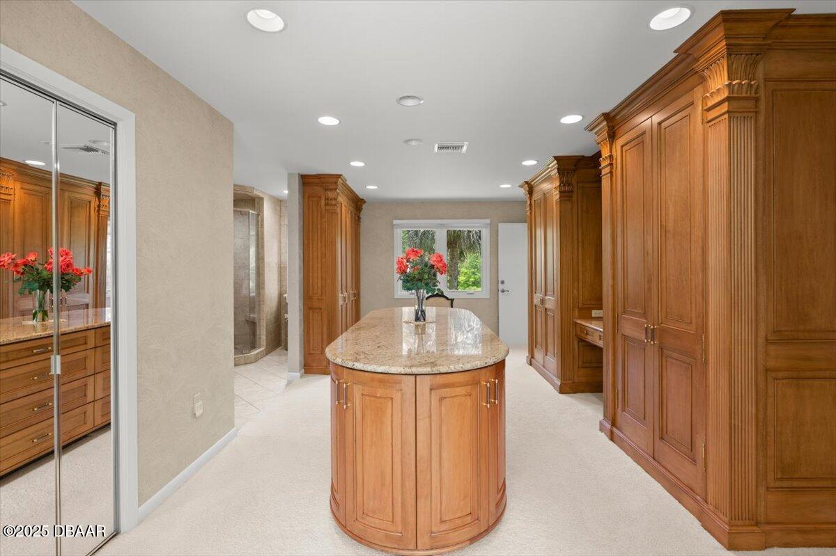 1010 Big Tree Road Daytona Beach, FL 32119 - Photo 4 of 41 a view of a hallway with dining table and chairs