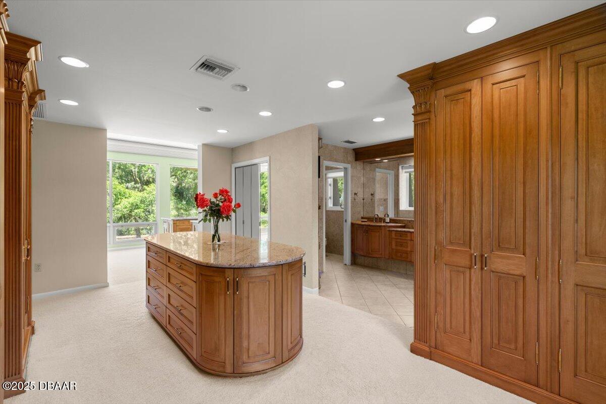 1010 Big Tree Road Daytona Beach, FL 32119 - Photo 5 of 41 a kitchen with stainless steel appliances granite countertop a stove and a refrigerator