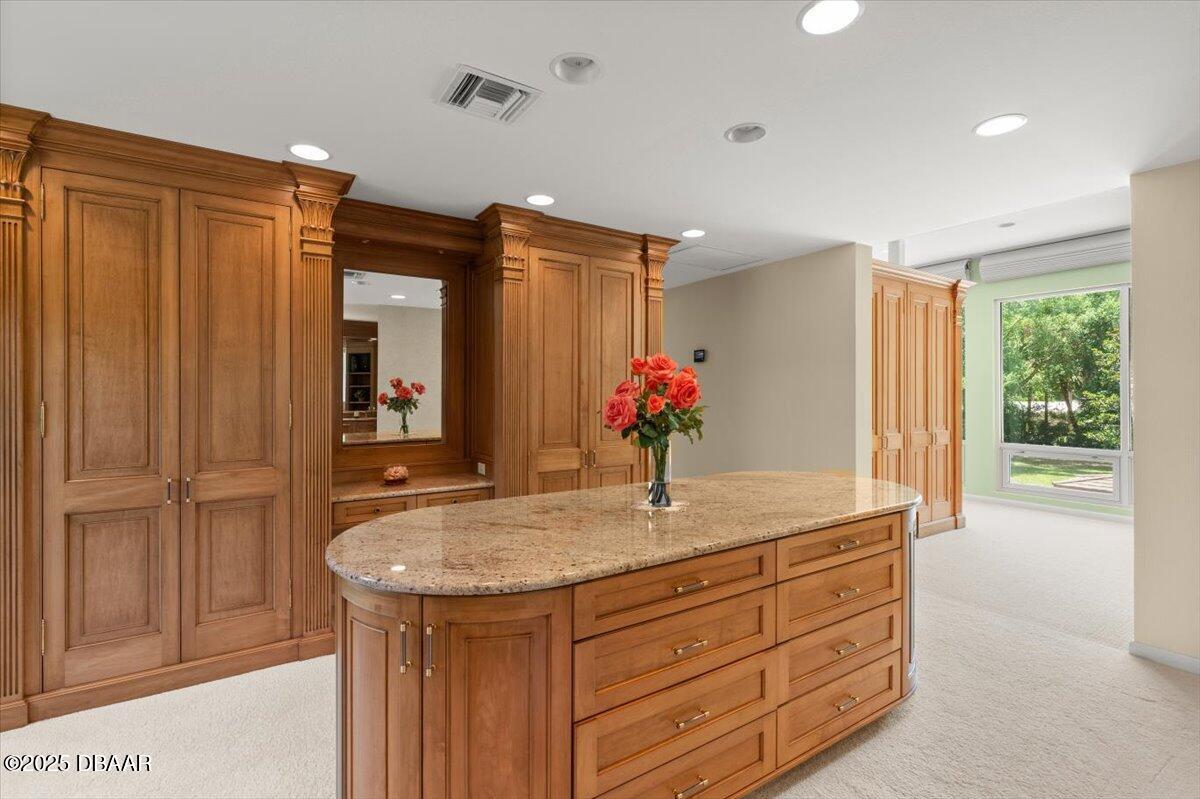 1010 Big Tree Road Daytona Beach, FL 32119 - Photo 6 of 41 a bathroom with a granite countertop sink and a mirror