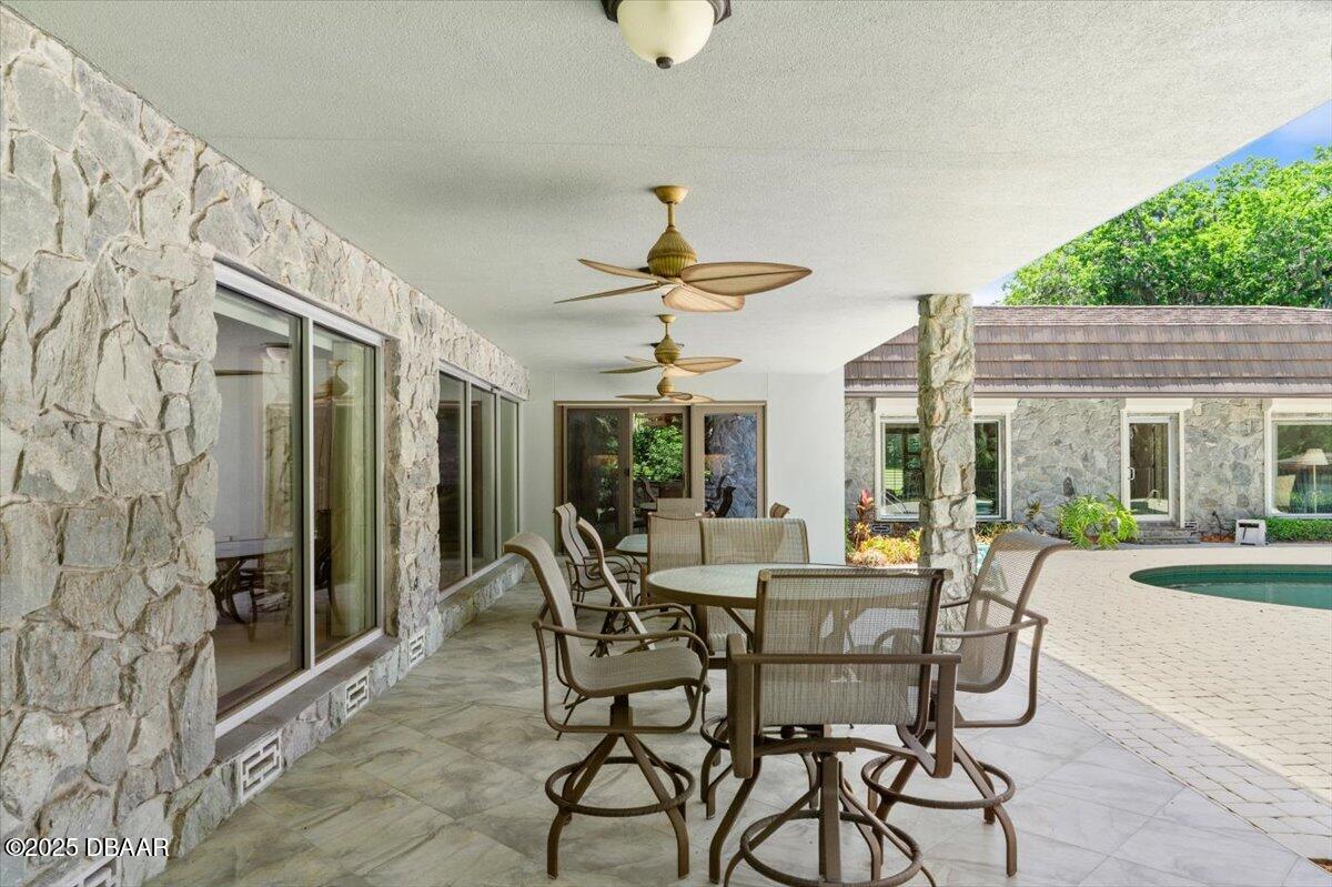 1010 Big Tree Road Daytona Beach, FL 32119 - Photo 10 of 41 a dining room with furniture window and outside view
