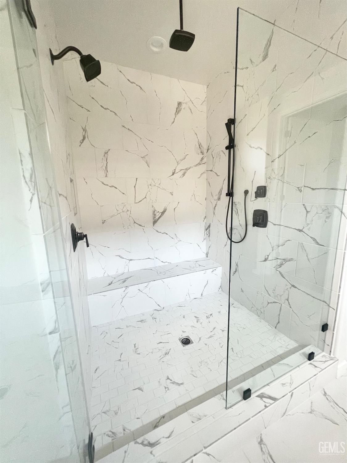 Undisclosed Address Bakersfield, CA 93314 - Photo 7 of 9 a bathroom with a shower