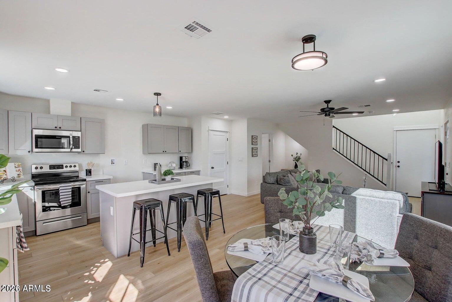 2509 East Broadway Road, Unit 2 Phoenix, AZ 85040 - Photo 6 of 47 a view of a dining room with furniture