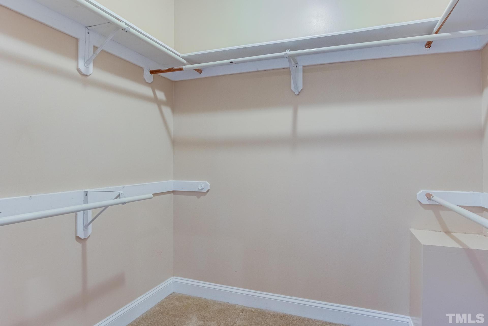2213 East Garner Road Raleigh, NC 27610 - Photo 42 of 74 a view of a room with racks on the wall