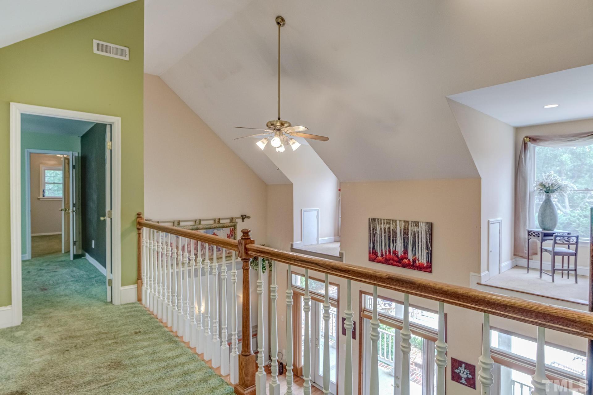 2213 East Garner Road Raleigh, NC 27610 - Photo 48 of 74 a view of a room with lots of windows and furniture