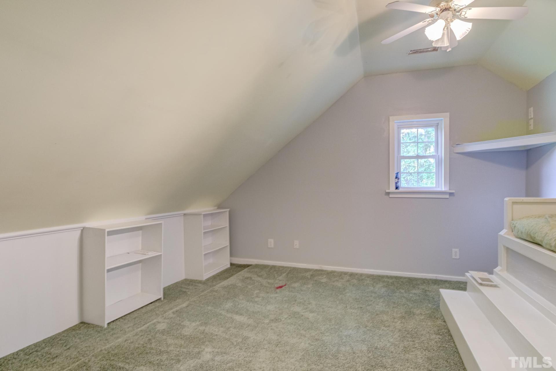 2213 East Garner Road Raleigh, NC 27610 - Photo 53 of 74 a view of an empty room with a window