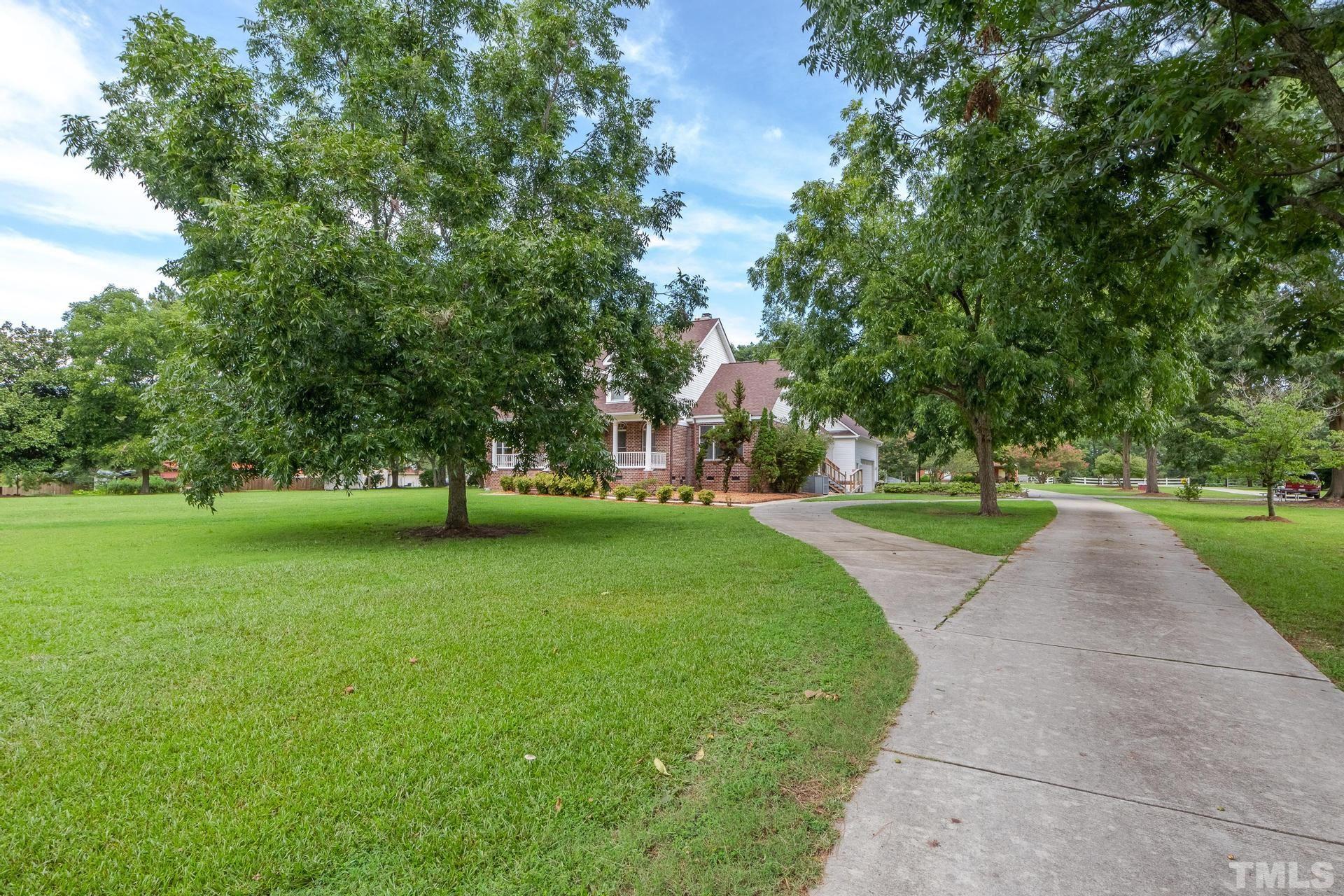 2213 East Garner Road Raleigh, NC 27610 - Photo 6 of 74 a view of a park with tree s