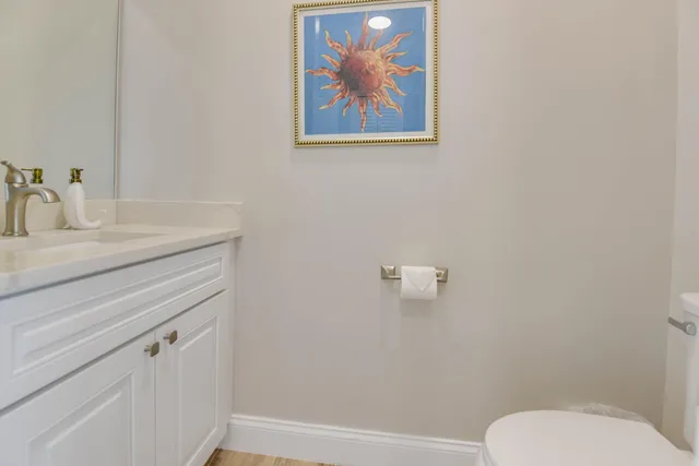 an aerial view of a house with a swimming pool