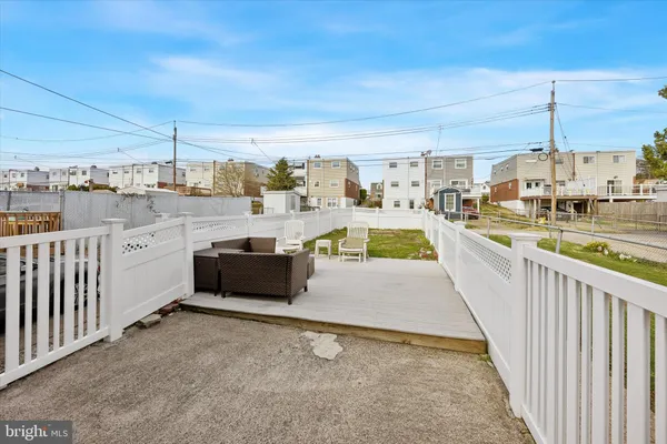 a view of a balcony with an ocean