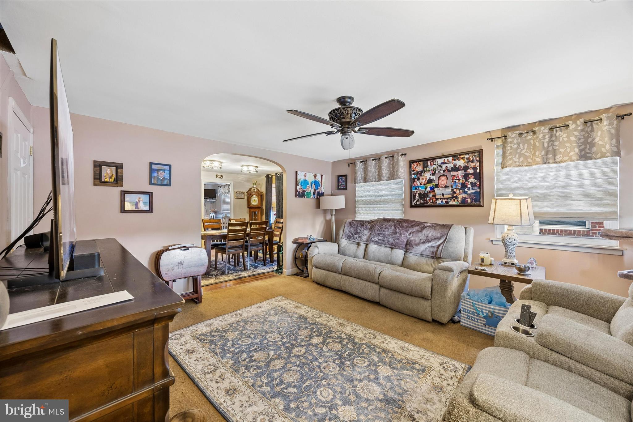 9640 Convent Avenue Philadelphia, PA 19114 - Photo 2 of 15 a living room with furniture and a flat screen tv
