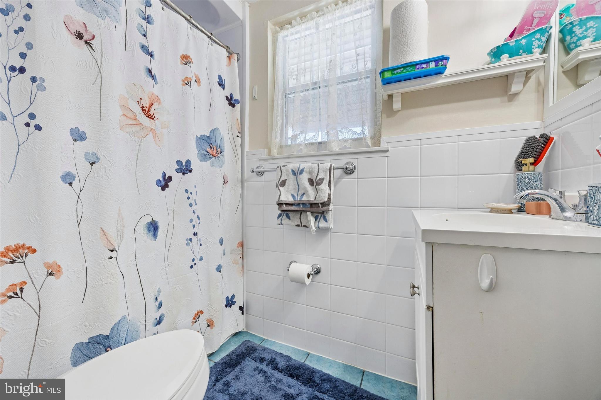 9640 Convent Avenue Philadelphia, PA 19114 - Photo 9 of 15 a bathroom with a sink toilet and shower