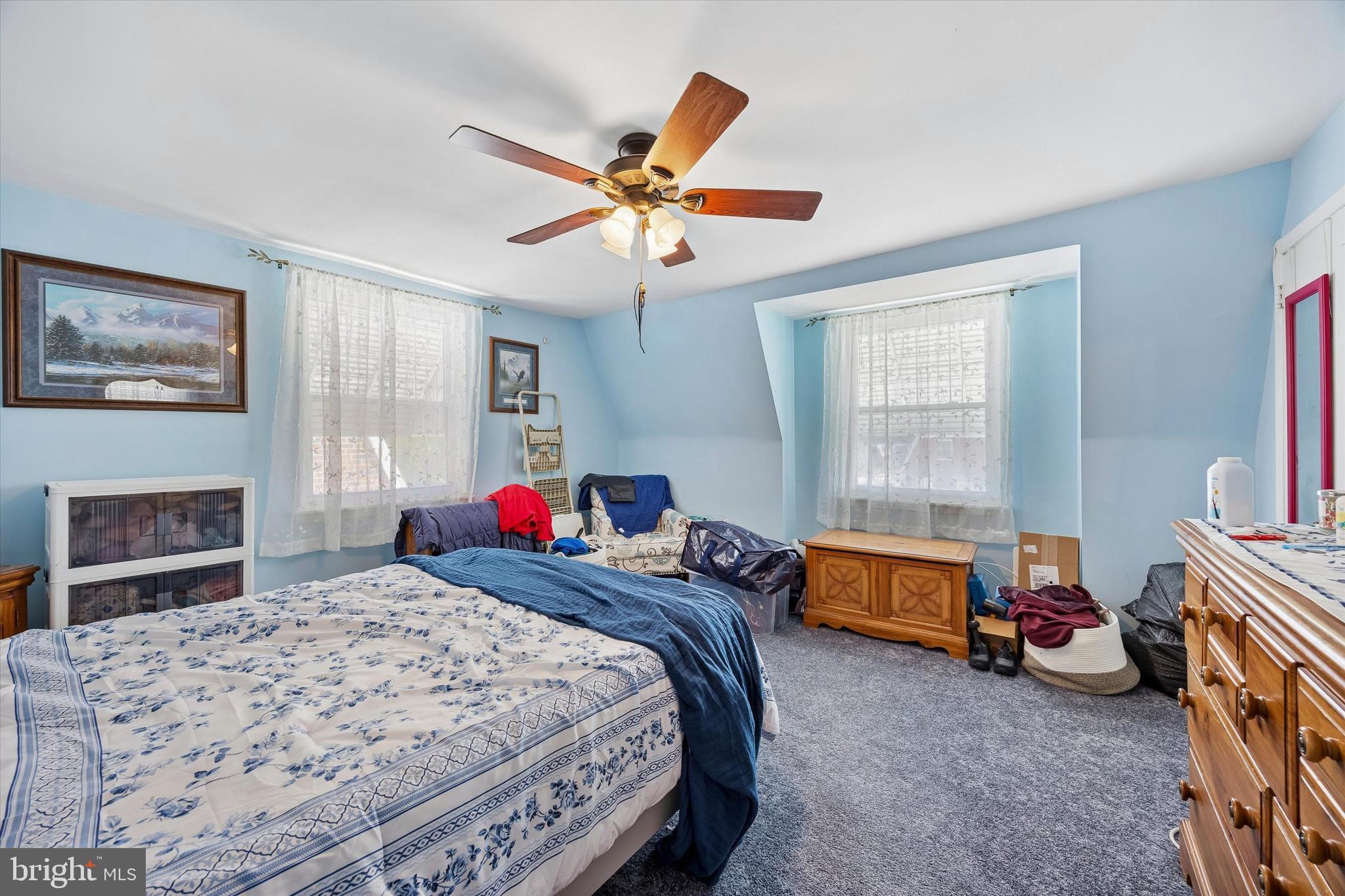 9640 Convent Avenue Philadelphia, PA 19114 - Photo 10 of 15 a bedroom with bed and a chandelier