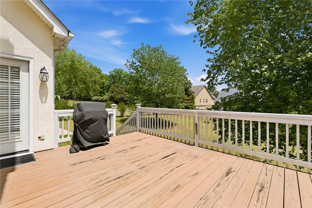 110 Garden Gate Drive Anderson, SC 29621 - Photo 32 of 35 This spacious wooden deck offers an ideal setting for outdoor enjoyment and relaxation.