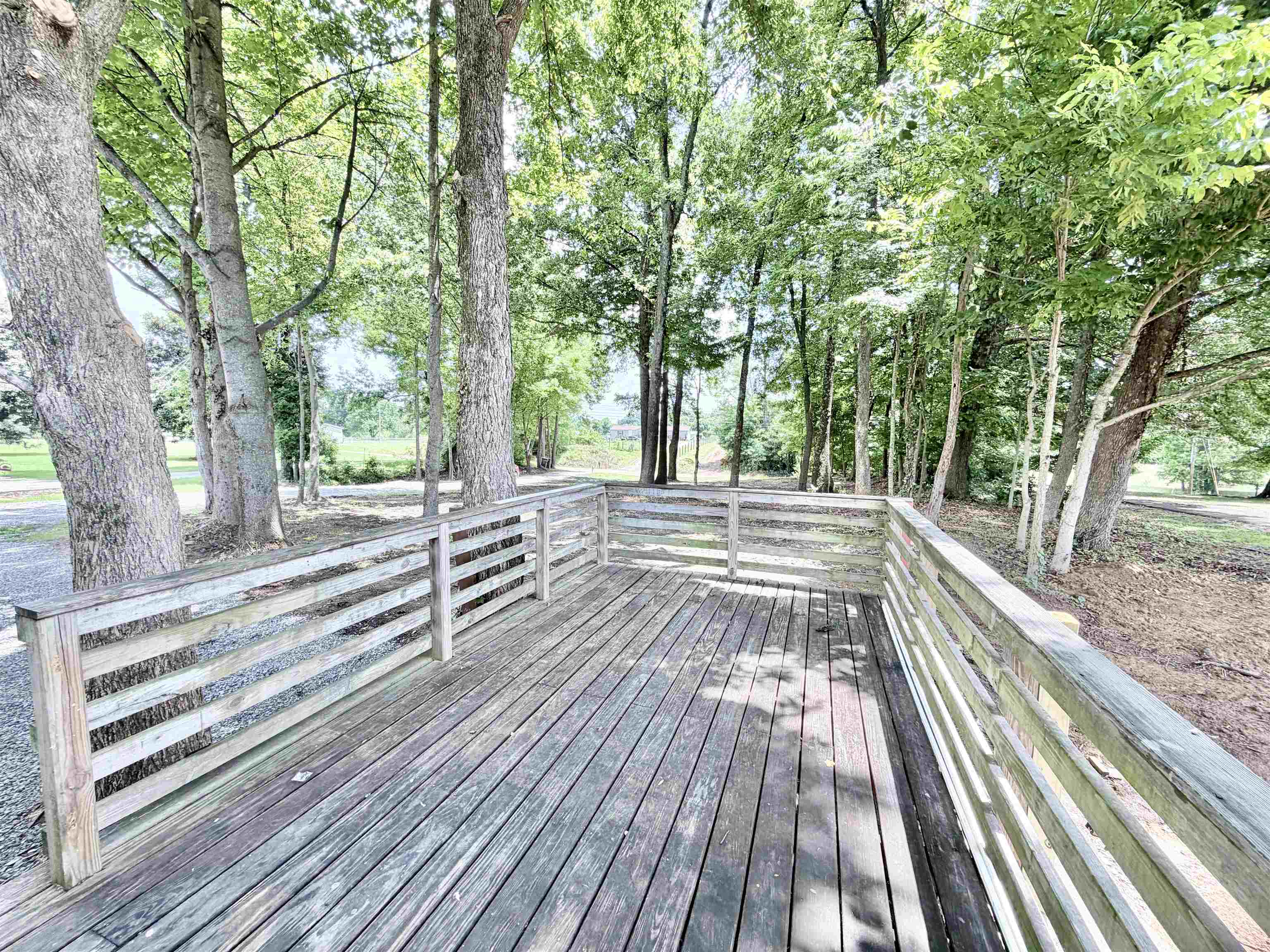 1655 Fayne Road Brighton, TN 38011 - Photo 28 of 28 Expansive outdoor decking surrounded by mature trees