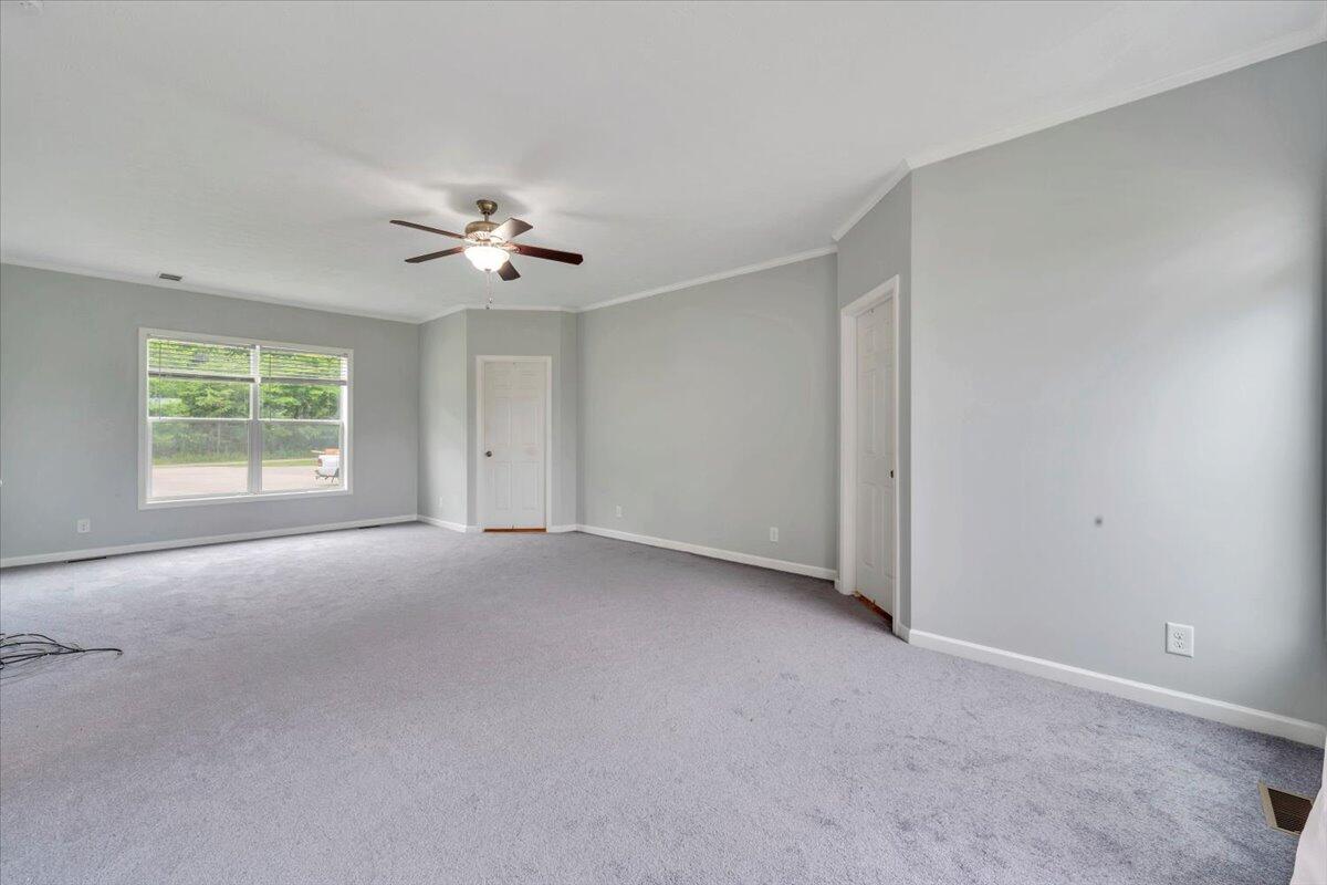 60 Tara Drive Ridgeway, VA 24148 - Photo 14 of 93 a view of a livingroom with a ceiling fan and window