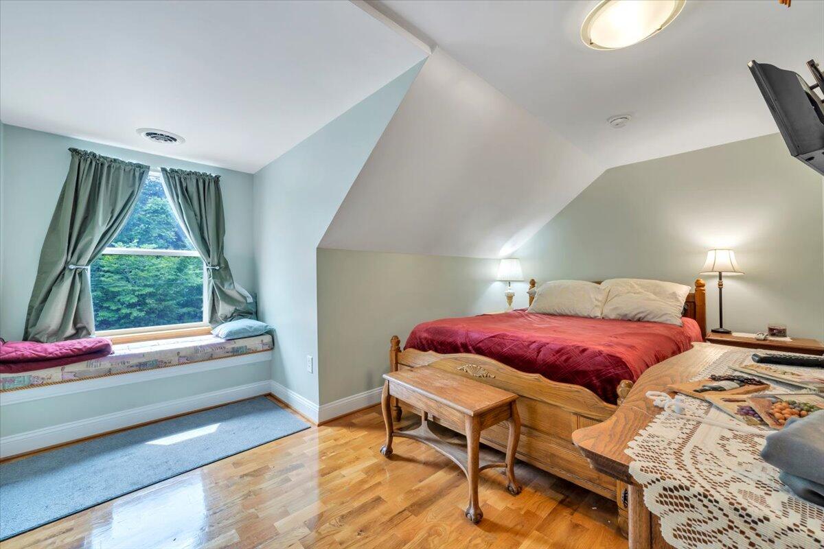 60 Tara Drive Ridgeway, VA 24148 - Photo 29 of 93 a bedroom with a bed and window