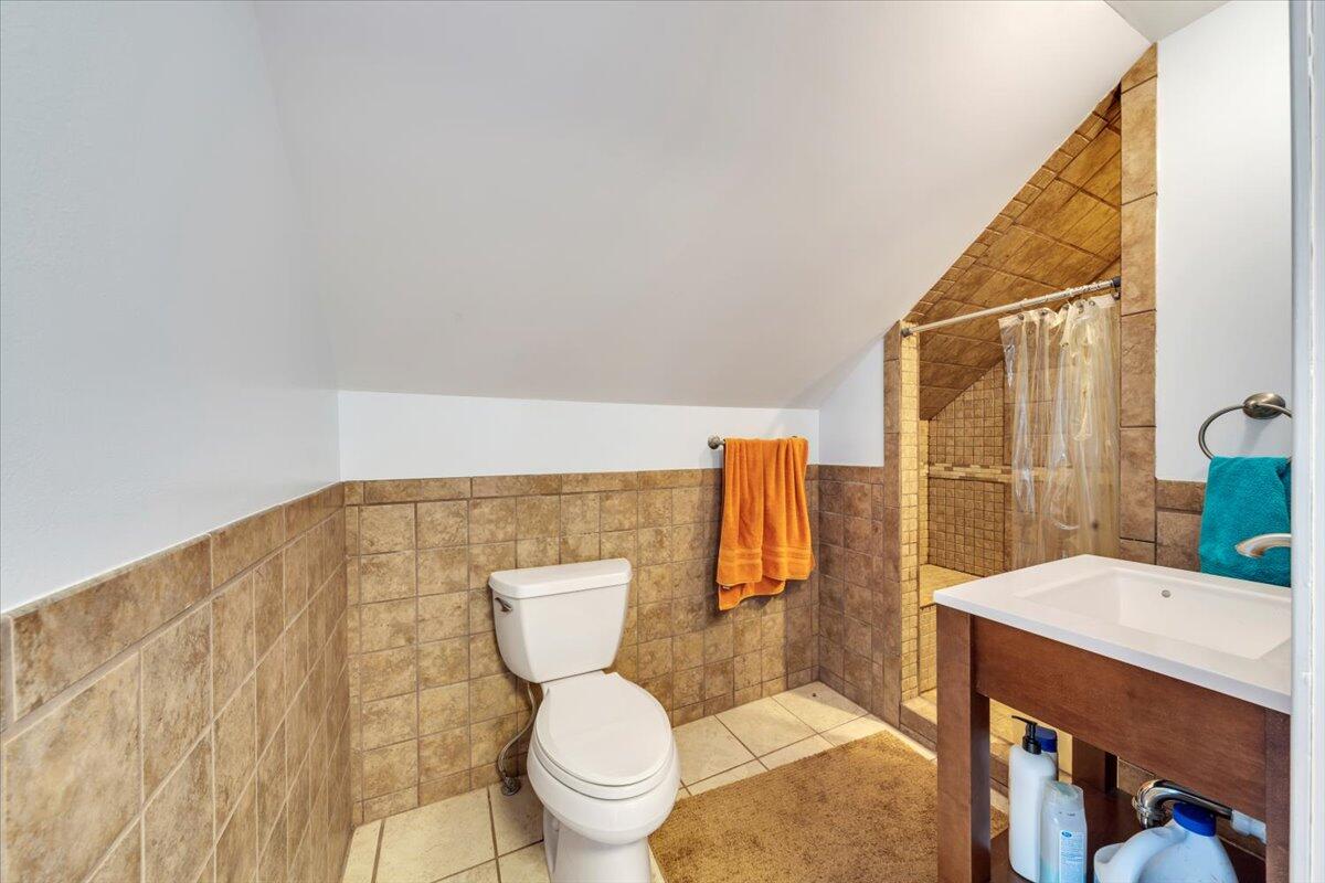 60 Tara Drive Ridgeway, VA 24148 - Photo 30 of 93 a bathroom with a sink mirror vanity and toilet