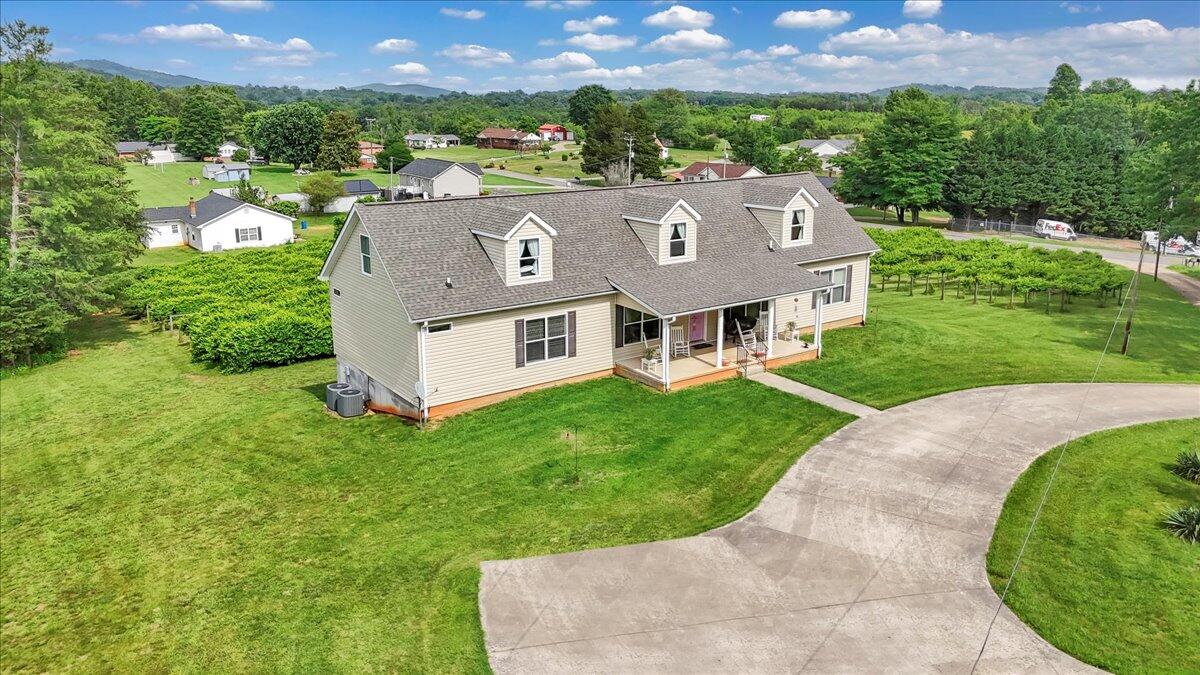 60 Tara Drive Ridgeway, VA 24148 - Photo 68 of 93 an aerial view of a house with a garden and a yard