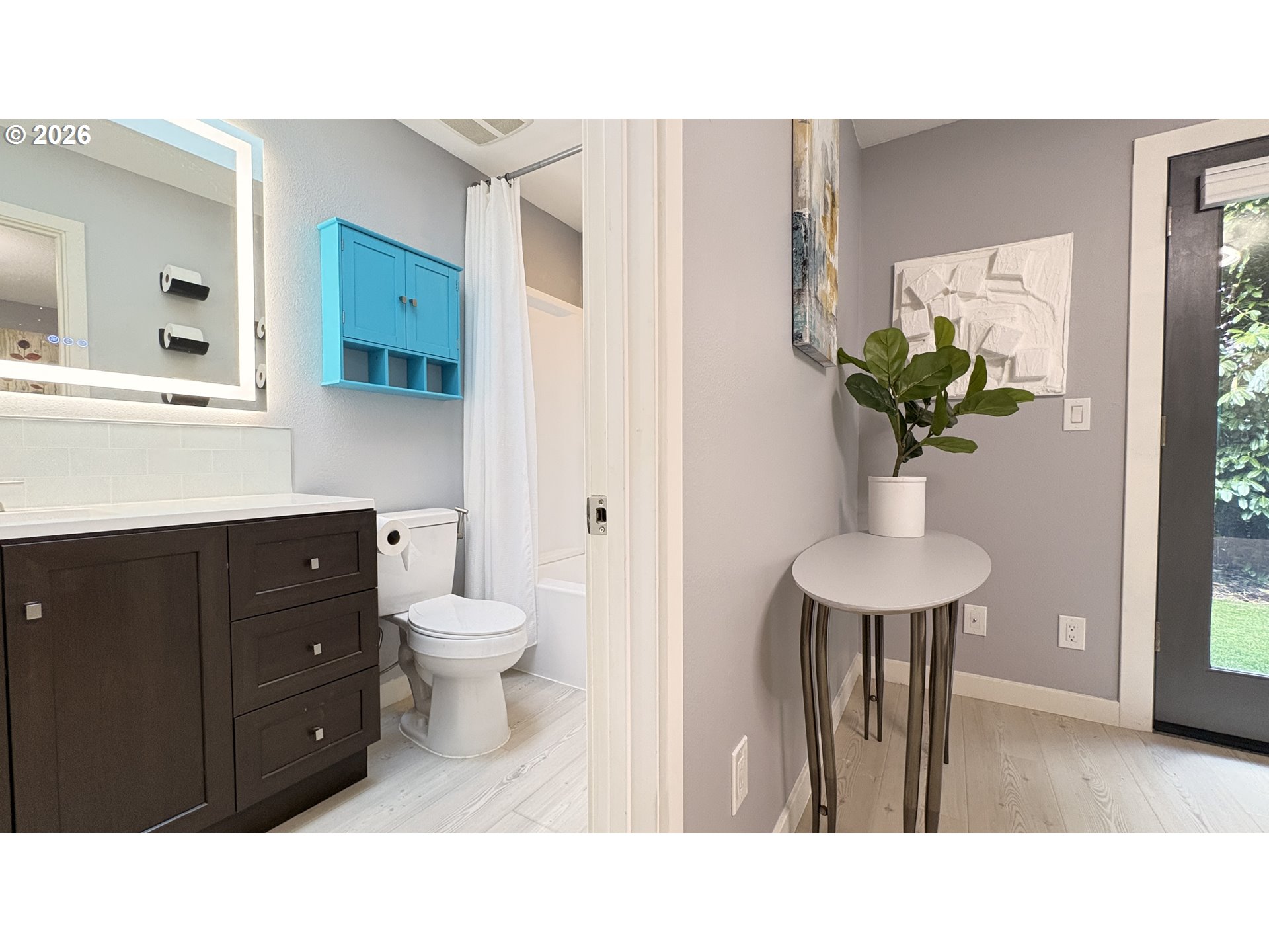 6650 Southwest Canby Street Portland, OR 97223 - Photo 25 of 34 a bathroom with a sink double vanity and a mirror