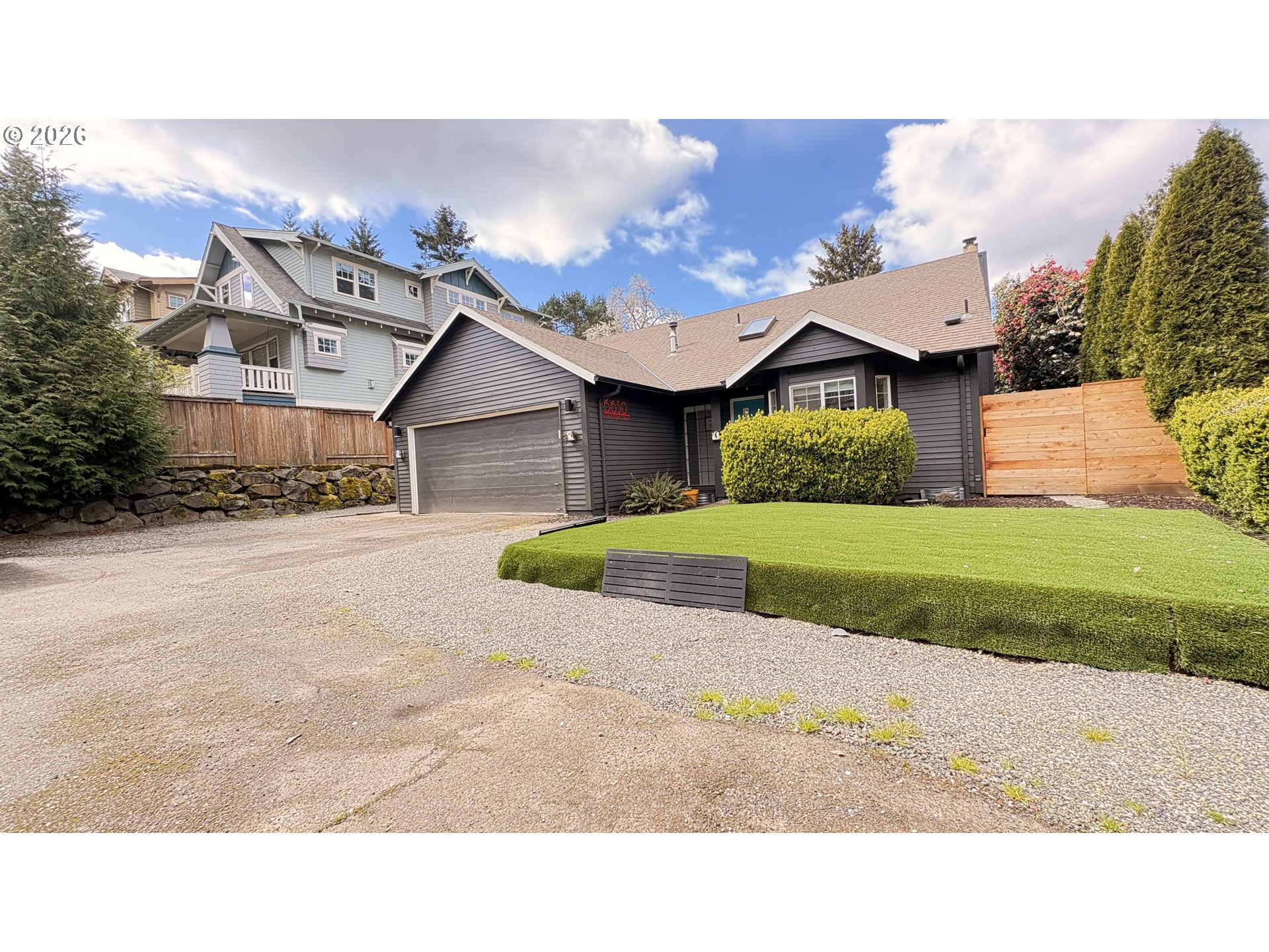 6650 Southwest Canby Street Portland, OR 97223 - Photo 32 of 34 a house view with a garden space