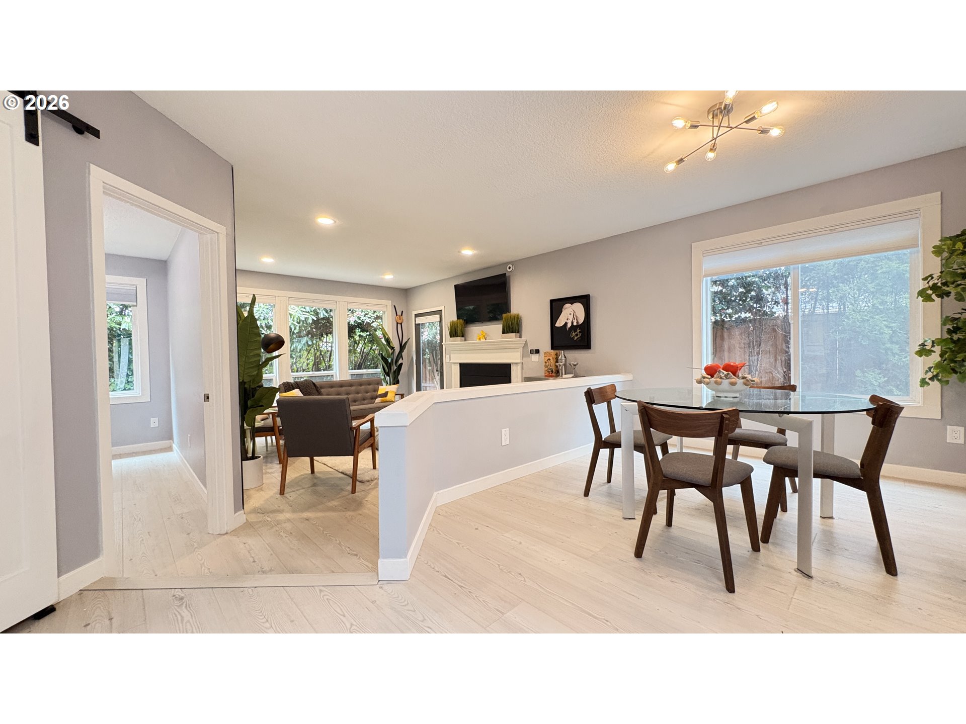 6650 Southwest Canby Street Portland, OR 97223 - Photo 9 of 34 a kitchen with a dining table chairs and a dining table
