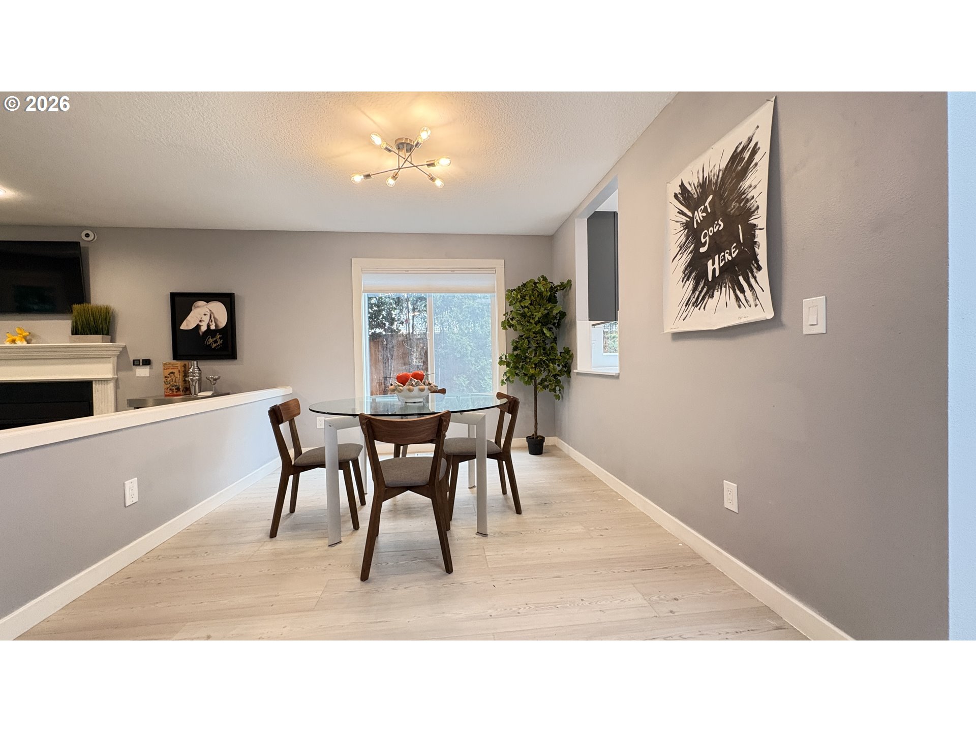 6650 Southwest Canby Street Portland, OR 97223 - Photo 10 of 34 a kitchen with a table and chairs