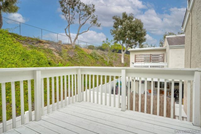 a view of a wooden fence
