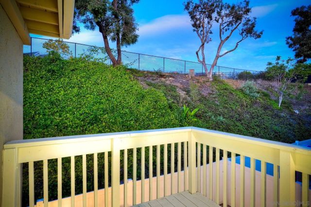 a view of a wooden fence