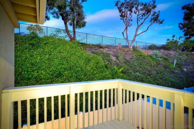 a view of a wooden fence