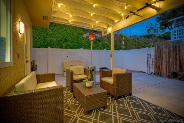 an aerial view of a house with a swimming pool