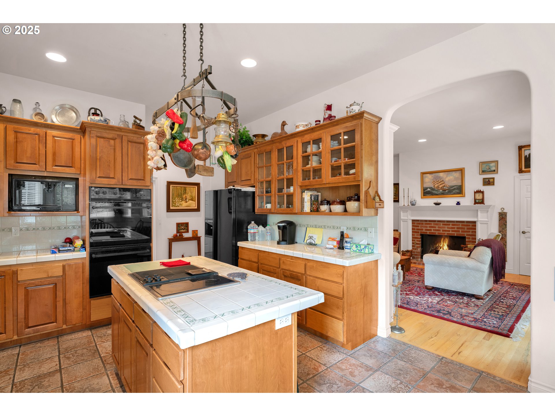 83485 Clear Lake Road Florence, OR 97439 - Photo 17 of 47 a kitchen with stainless steel appliances granite countertop a sink dishwasher and a dining table with the kitchen view