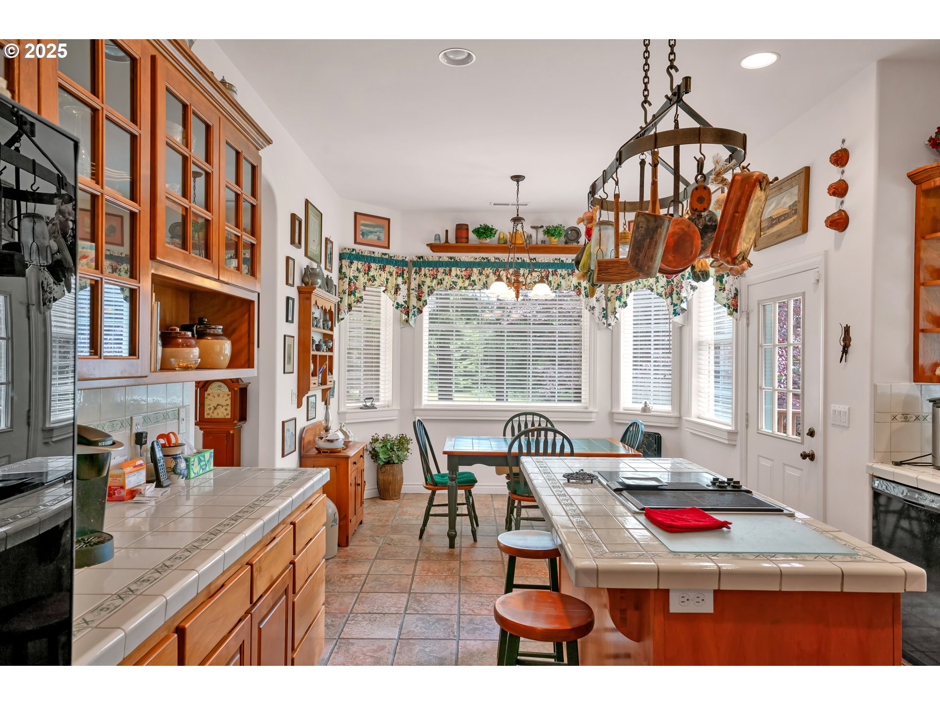 83485 Clear Lake Road Florence, OR 97439 - Photo 19 of 47 a dining room with furniture and a chandelier